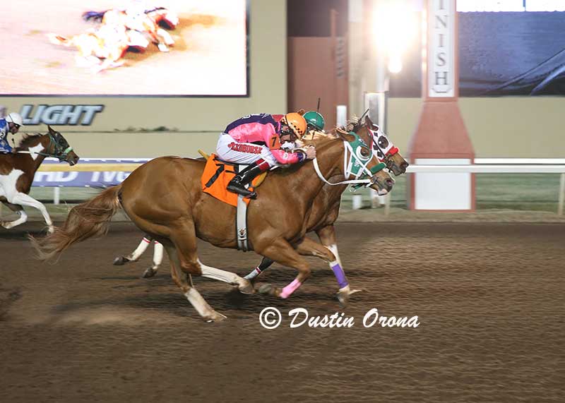 2016 World Champion Paint Ivoriona edging her rival PHQ Goodbye Earl for the top time at 350 yards